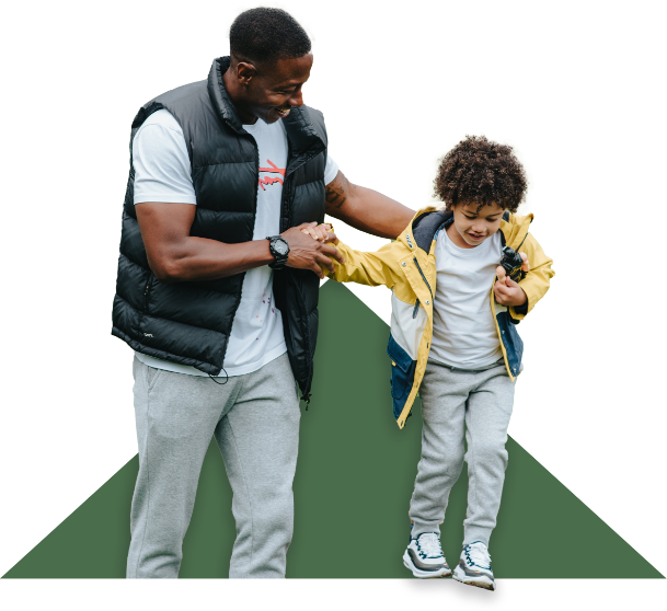 A father and son sharing a moment of laughter, symbolizing the joy of emotional connection in modern fatherhood.